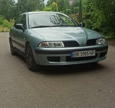 Зелений Міцубісі Харизма, об'ємом двигуна 1.6 л та пробігом 292 тис. км за 3200 $, фото 15 на Automoto.ua