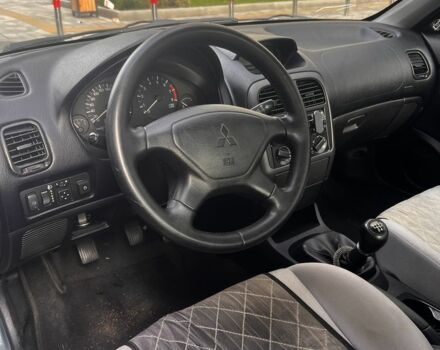 Зеленый Мицубиси Харизма, объемом двигателя 1.6 л и пробегом 211 тыс. км за 3200 $, фото 1 на Automoto.ua