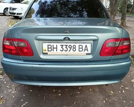 Зеленый Мицубиси Харизма, объемом двигателя 1.6 л и пробегом 281 тыс. км за 3900 $, фото 3 на Automoto.ua