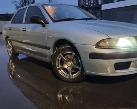 Зеленый Мицубиси Харизма, объемом двигателя 1.6 л и пробегом 220 тыс. км за 3200 $, фото 1 на Automoto.ua