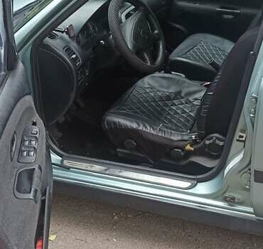 Зелений Міцубісі Харизма, об'ємом двигуна 1.6 л та пробігом 292 тис. км за 3200 $, фото 6 на Automoto.ua