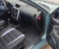 Зеленый Мицубиси Харизма, объемом двигателя 1.6 л и пробегом 375 тыс. км за 3500 $, фото 2 на Automoto.ua