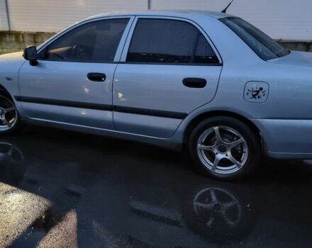 Зеленый Мицубиси Харизма, объемом двигателя 1.6 л и пробегом 220 тыс. км за 3200 $, фото 4 на Automoto.ua