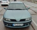 Зеленый Мицубиси Харизма, объемом двигателя 1.6 л и пробегом 375 тыс. км за 3500 $, фото 1 на Automoto.ua