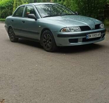 Зелений Міцубісі Харизма, об'ємом двигуна 1.6 л та пробігом 292 тис. км за 3200 $, фото 12 на Automoto.ua