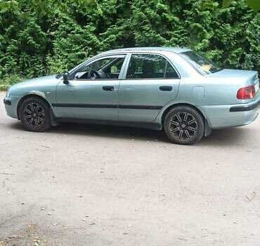 Зелений Міцубісі Харизма, об'ємом двигуна 1.6 л та пробігом 292 тис. км за 3200 $, фото 7 на Automoto.ua