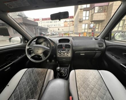 Зеленый Мицубиси Харизма, объемом двигателя 1.6 л и пробегом 211 тыс. км за 3200 $, фото 8 на Automoto.ua