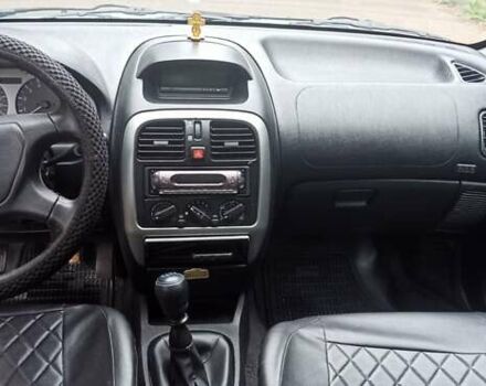 Зелений Міцубісі Харизма, об'ємом двигуна 1.6 л та пробігом 292 тис. км за 3200 $, фото 3 на Automoto.ua