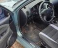 Зеленый Мицубиси Харизма, объемом двигателя 1.6 л и пробегом 375 тыс. км за 3500 $, фото 1 на Automoto.ua