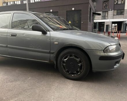 Зеленый Мицубиси Харизма, объемом двигателя 1.6 л и пробегом 211 тыс. км за 3200 $, фото 7 на Automoto.ua