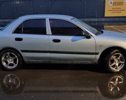 Зеленый Мицубиси Харизма, объемом двигателя 1.6 л и пробегом 220 тыс. км за 3200 $, фото 2 на Automoto.ua