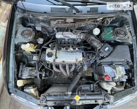 Зеленый Мицубиси Харизма, объемом двигателя 1.6 л и пробегом 330 тыс. км за 2700 $, фото 10 на Automoto.ua