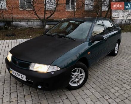 Зеленый Мицубиси Харизма, объемом двигателя 1.6 л и пробегом 357 тыс. км за 1480 $, фото 10 на Automoto.ua