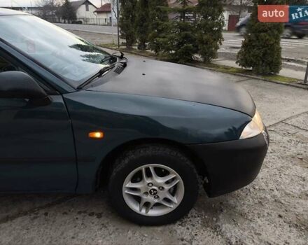 Зеленый Мицубиси Харизма, объемом двигателя 1.6 л и пробегом 357 тыс. км за 1480 $, фото 12 на Automoto.ua