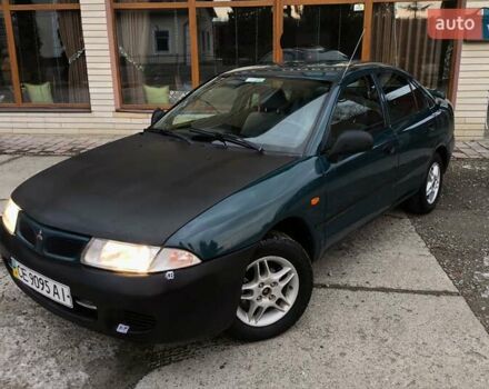 Зелений Міцубісі Харизма, об'ємом двигуна 1.6 л та пробігом 357 тис. км за 1480 $, фото 4 на Automoto.ua