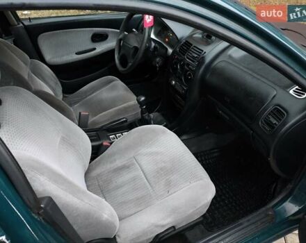 Зеленый Мицубиси Харизма, объемом двигателя 1.6 л и пробегом 357 тыс. км за 1480 $, фото 16 на Automoto.ua