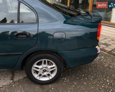 Зелений Міцубісі Харизма, об'ємом двигуна 1.6 л та пробігом 357 тис. км за 1480 $, фото 20 на Automoto.ua