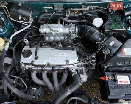 Зелений Міцубісі Харизма, об'ємом двигуна 1.6 л та пробігом 357 тис. км за 1499 $, фото 22 на Automoto.ua