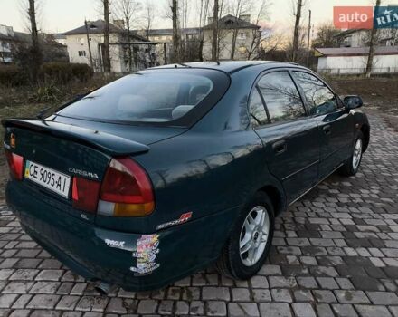 Зелений Міцубісі Харизма, об'ємом двигуна 1.6 л та пробігом 357 тис. км за 1499 $, фото 2 на Automoto.ua