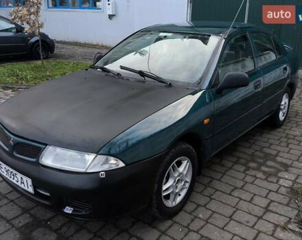 Зелений Міцубісі Харизма, об'ємом двигуна 1.6 л та пробігом 357 тис. км за 1399 $, фото 2 на Automoto.ua