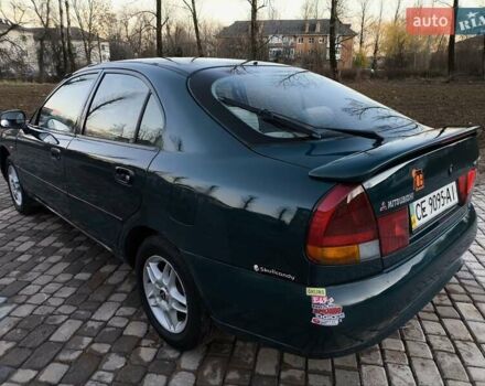 Зелений Міцубісі Харизма, об'ємом двигуна 1.6 л та пробігом 357 тис. км за 1499 $, фото 3 на Automoto.ua