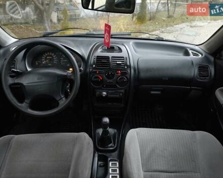 Зелений Міцубісі Харизма, об'ємом двигуна 1.6 л та пробігом 357 тис. км за 1399 $, фото 12 на Automoto.ua