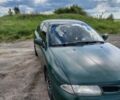 Зеленый Мицубиси Харизма, объемом двигателя 1.6 л и пробегом 399 тыс. км за 2300 $, фото 1 на Automoto.ua