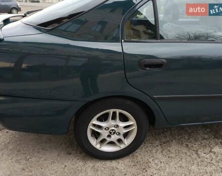 Зеленый Мицубиси Харизма, объемом двигателя 1.6 л и пробегом 357 тыс. км за 1480 $, фото 18 на Automoto.ua