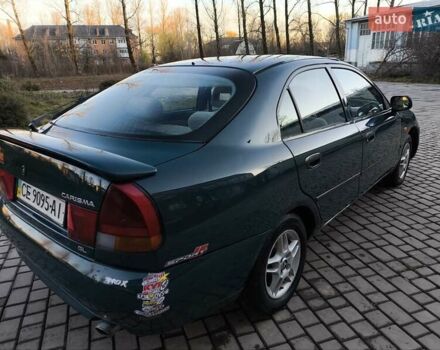 Зелений Міцубісі Харизма, об'ємом двигуна 1.6 л та пробігом 357 тис. км за 1499 $, фото 17 на Automoto.ua