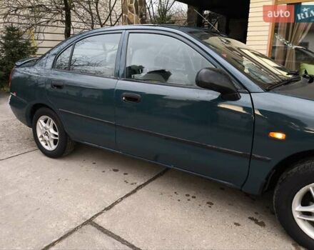 Зеленый Мицубиси Харизма, объемом двигателя 1.6 л и пробегом 357 тыс. км за 1480 $, фото 4 на Automoto.ua