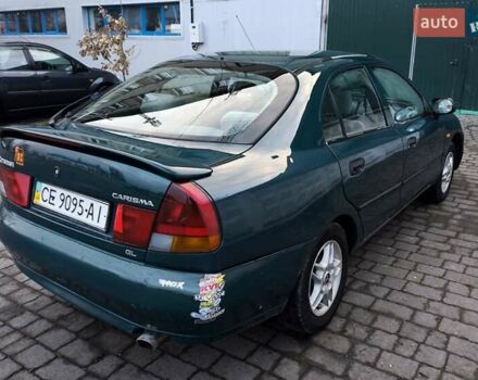 Зелений Міцубісі Харизма, об'ємом двигуна 1.6 л та пробігом 357 тис. км за 1399 $, фото 5 на Automoto.ua