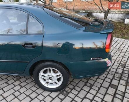 Зелений Міцубісі Харизма, об'ємом двигуна 1.6 л та пробігом 357 тис. км за 1499 $, фото 21 на Automoto.ua