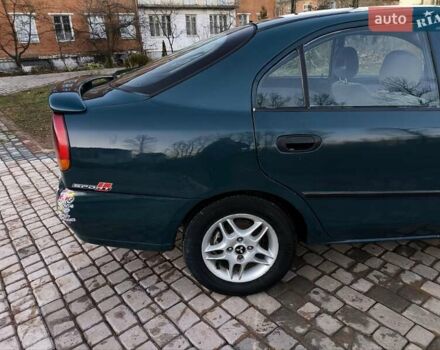 Зелений Міцубісі Харизма, об'ємом двигуна 1.6 л та пробігом 357 тис. км за 1499 $, фото 9 на Automoto.ua