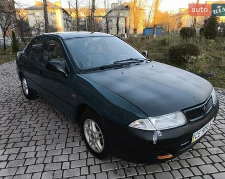 Зелений Міцубісі Харизма, об'ємом двигуна 1.6 л та пробігом 357 тис. км за 1499 $, фото 4 на Automoto.ua