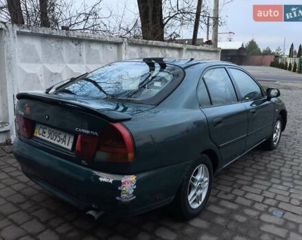 Зелений Міцубісі Харизма, об'ємом двигуна 1.6 л та пробігом 357 тис. км за 1399 $, фото 7 на Automoto.ua