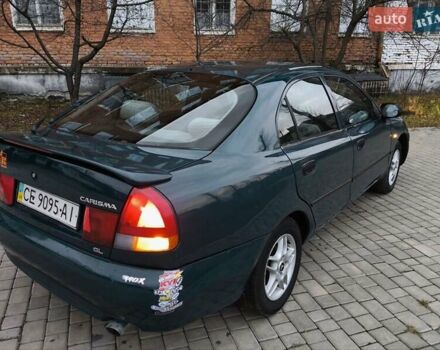 Зелений Міцубісі Харизма, об'ємом двигуна 1.6 л та пробігом 357 тис. км за 1480 $, фото 7 на Automoto.ua