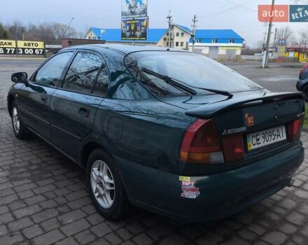 Зелений Міцубісі Харизма, об'ємом двигуна 1.6 л та пробігом 357 тис. км за 1399 $, фото 1 на Automoto.ua