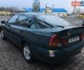 Зелений Міцубісі Харизма, об'ємом двигуна 1.6 л та пробігом 357 тис. км за 1399 $, фото 1 на Automoto.ua