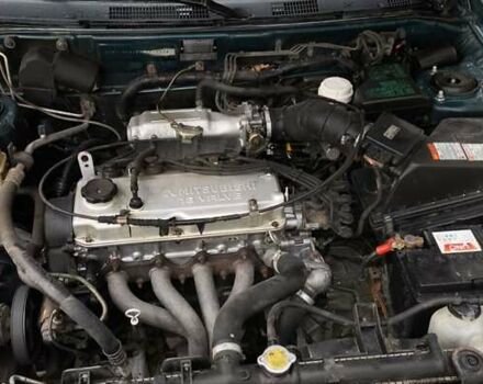 Зеленый Мицубиси Харизма, объемом двигателя 1.6 л и пробегом 357 тыс. км за 1480 $, фото 5 на Automoto.ua