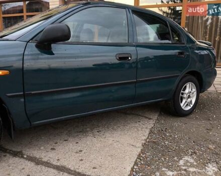 Зелений Міцубісі Харизма, об'ємом двигуна 1.6 л та пробігом 357 тис. км за 1480 $, фото 15 на Automoto.ua