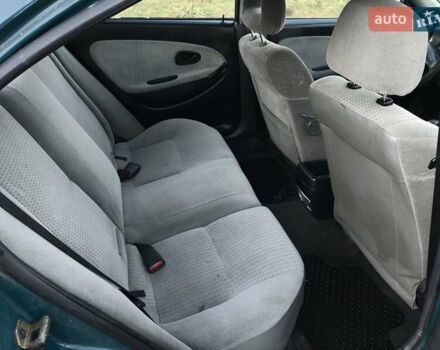 Зелений Міцубісі Харизма, об'ємом двигуна 1.6 л та пробігом 357 тис. км за 1499 $, фото 18 на Automoto.ua