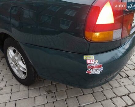 Зелений Міцубісі Харизма, об'ємом двигуна 1.6 л та пробігом 357 тис. км за 1480 $, фото 14 на Automoto.ua