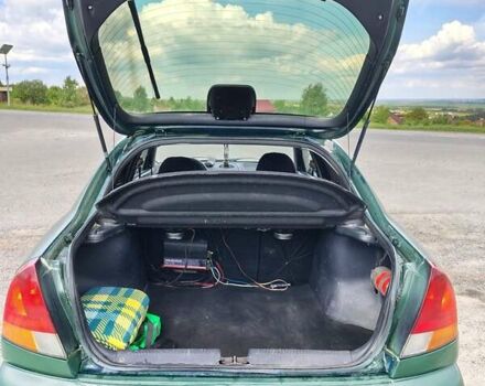 Зеленый Мицубиси Харизма, объемом двигателя 1.6 л и пробегом 399 тыс. км за 2300 $, фото 3 на Automoto.ua