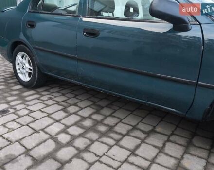 Зелений Міцубісі Харизма, об'ємом двигуна 1.6 л та пробігом 357 тис. км за 1399 $, фото 9 на Automoto.ua