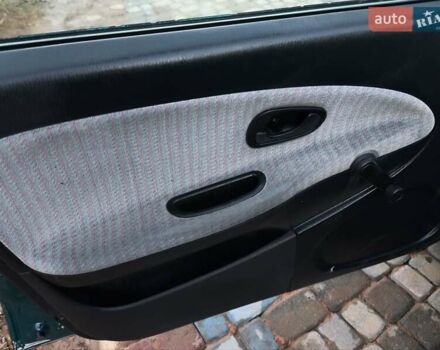 Зелений Міцубісі Харизма, об'ємом двигуна 1.6 л та пробігом 357 тис. км за 1499 $, фото 16 на Automoto.ua