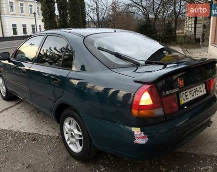 Зеленый Мицубиси Харизма, объемом двигателя 1.6 л и пробегом 357 тыс. км за 1480 $, фото 6 на Automoto.ua
