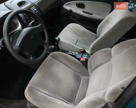 Зеленый Мицубиси Харизма, объемом двигателя 1.6 л и пробегом 357 тыс. км за 1480 $, фото 8 на Automoto.ua