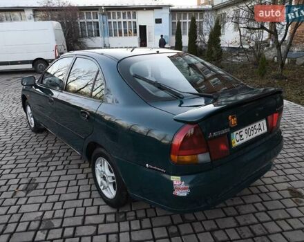 Зелений Міцубісі Харизма, об'ємом двигуна 1.6 л та пробігом 357 тис. км за 1499 $, фото 24 на Automoto.ua