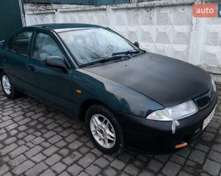 Зелений Міцубісі Харизма, об'ємом двигуна 1.6 л та пробігом 357 тис. км за 1399 $, фото 4 на Automoto.ua