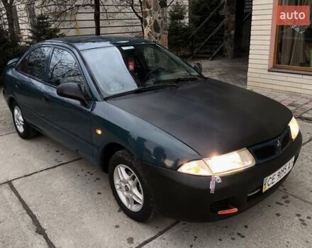 Зеленый Мицубиси Харизма, объемом двигателя 1.6 л и пробегом 357 тыс. км за 1480 $, фото 9 на Automoto.ua